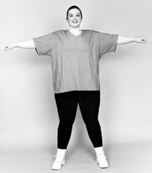 photo of large woman with arms outstretched